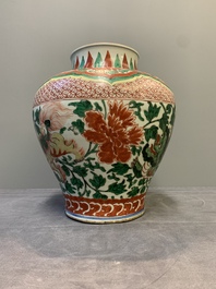 A Chinese wucai 'Buddhist lion and peony scroll' vase, Transitional period