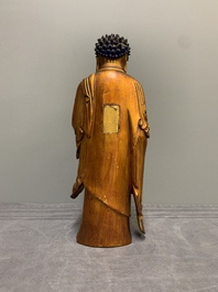 A fine Chinese gilt-lacquered wooden figure of the standing Buddha, Ming