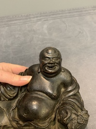 A Chinese bronze Budai, 17th C.