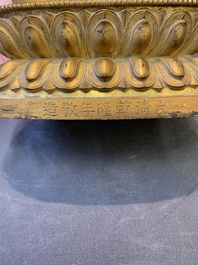 A fine Chinese gilt bronze Buddha, Qianlong mark and of the period