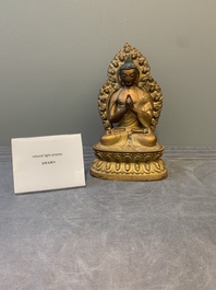 A fine Chinese gilt bronze Buddha, Qianlong mark and of the period