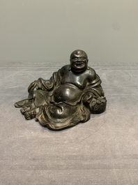 A Chinese bronze Budai, 17th C.