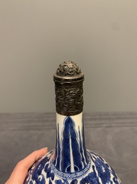 A Chinese blue and white silver-mounted 'landscape' bottle vase, Kangxi
