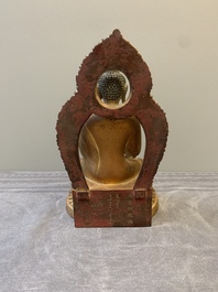 A fine Chinese gilt bronze Buddha, Qianlong mark and of the period