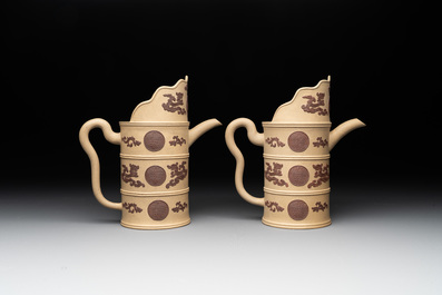 A pair of very rare Chinese Yixing stoneware 'duomuhu' ewers and covers, Kangxi