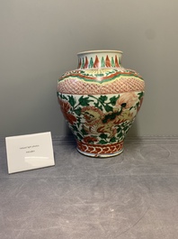 A Chinese wucai 'Buddhist lion and peony scroll' vase, Transitional period