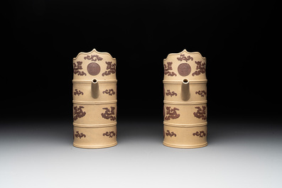 A pair of very rare Chinese Yixing stoneware 'duomuhu' ewers and covers, Kangxi
