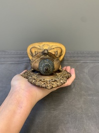 A fine Chinese gilt bronze Buddha, Qianlong mark and of the period