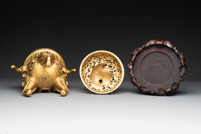 A large Chinese precious stone-inlaid gilt bronze 'elephant' tripod censer and cover on wooden stand, 19th C.