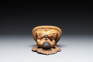 A fine Chinese gilt bronze Buddha, Qianlong mark and of the period