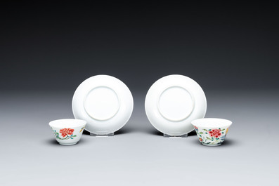 Four Chinese famille rose 'rooster' cups and five saucers, Yongzheng