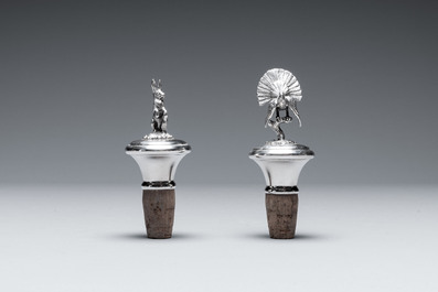 Two silver bottle stoppers, a tobacco box and a baby rattle with red coral teether, Germany, 19/20th C.