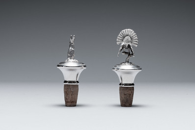 Two silver bottle stoppers, a tobacco box and a baby rattle with red coral teether, Germany, 19/20th C.