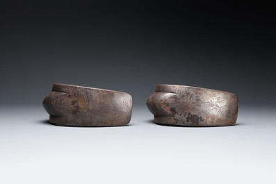 A pair of Japanese steel 'abumi' stirrups with silver and mother-of-pearl-inlay, Edo, 18/19th C.