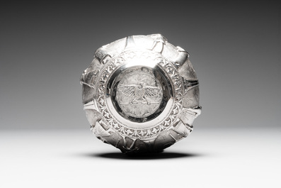 A repouss&eacute; silver bowl depicting priests and Egyptian gods, Alexandria, 1919-1920