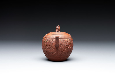 A Chinese Yixing stoneware teapot with boys among flower scrolls, Kangxi