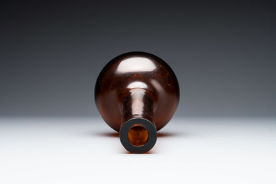 A rare Chinese translucent amber-coloured Peking glass bottle vase, Qianlong mark and of the period