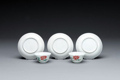Four Chinese famille rose 'rooster' cups and five saucers, Yongzheng