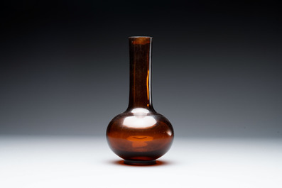 A rare Chinese translucent amber-coloured Peking glass bottle vase, Qianlong mark and of the period