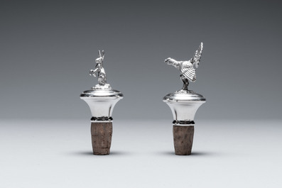 Two silver bottle stoppers, a tobacco box and a baby rattle with red coral teether, Germany, 19/20th C.