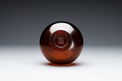 A rare Chinese translucent amber-coloured Peking glass bottle vase, Qianlong mark and of the period