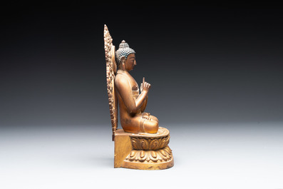 A fine Chinese gilt bronze Buddha, Qianlong mark and of the period