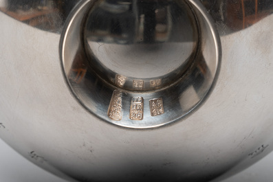 A Japanese silver cigar box with imperial crest and two commemorative silver sake cups, 19/20th C.