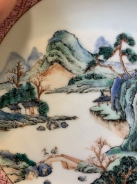 Two Chinese famille rose cups and three saucers with a fine landscape design, Yongzheng/Qianlong