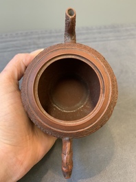 A Chinese Yixing stoneware teapot with boys among flower scrolls, Kangxi