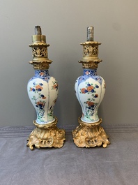 A pair of Chinese famille verte vases mounted as lamps, Kangxi