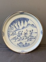 A rare Chinese silver-mounted blue and white 'Eight horses of Mu Wang' dish, Kangxi