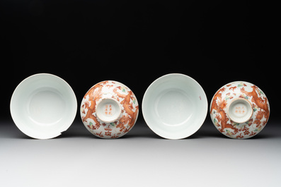 Two famille rose 'dragon' bowls and covers and a plate, Qianlong and Guangxu marks, 19/20th C.