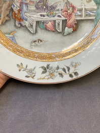 A fine pair of Chinese Canton famille rose 'ladies in the garden' plates, Yongzheng/Qianlong