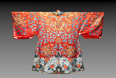 A fine Chinese gold thread embroidered red-ground silk noble lady&rsquo;s 'dragon' robe, 18/19th C.