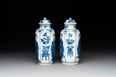 A pair of Chinese blue and white 'Long Eliza' vases and covers, jade mark, Kangxi