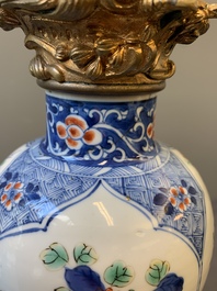 A pair of Chinese famille verte vases mounted as lamps, Kangxi