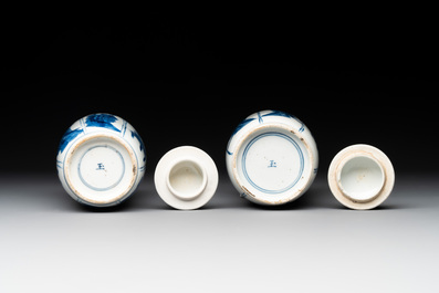 A pair of Chinese blue and white 'Long Eliza' vases and covers, jade mark, Kangxi