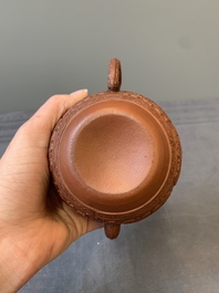 A Chinese Yixing stoneware teapot with boys among flower scrolls, Kangxi