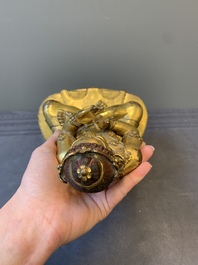 A Sino-Tibetan gilt bronze Virūpa, 19th C.