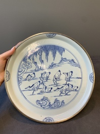 A rare Chinese silver-mounted blue and white 'Eight horses of Mu Wang' dish, Kangxi
