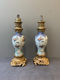 A pair of Chinese famille verte vases mounted as lamps, Kangxi