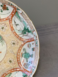 A Chinese blue and white vase after Venetian glass model, a famille verte plate and a famille rose bowl, Kangxi/Qianlong