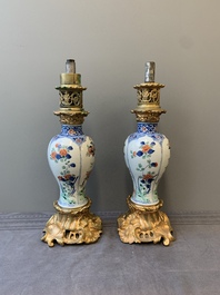A pair of Chinese famille verte vases mounted as lamps, Kangxi