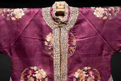 Two Chinese embroidered silk children's robes, 19th C.