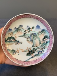 Two Chinese famille rose cups and three saucers with a fine landscape design, Yongzheng/Qianlong