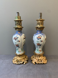 A pair of Chinese famille verte vases mounted as lamps, Kangxi