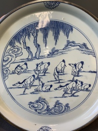 A rare Chinese silver-mounted blue and white 'Eight horses of Mu Wang' dish, Kangxi