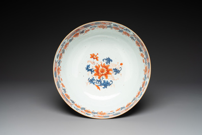 A large Chinese famille rose blue-ground punch bowl and dish, Qianlong