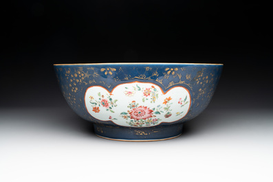 A large Chinese famille rose blue-ground punch bowl and dish, Qianlong
