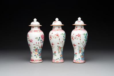A Chinese famille rose 'birds' garniture with five vases, Qianlong